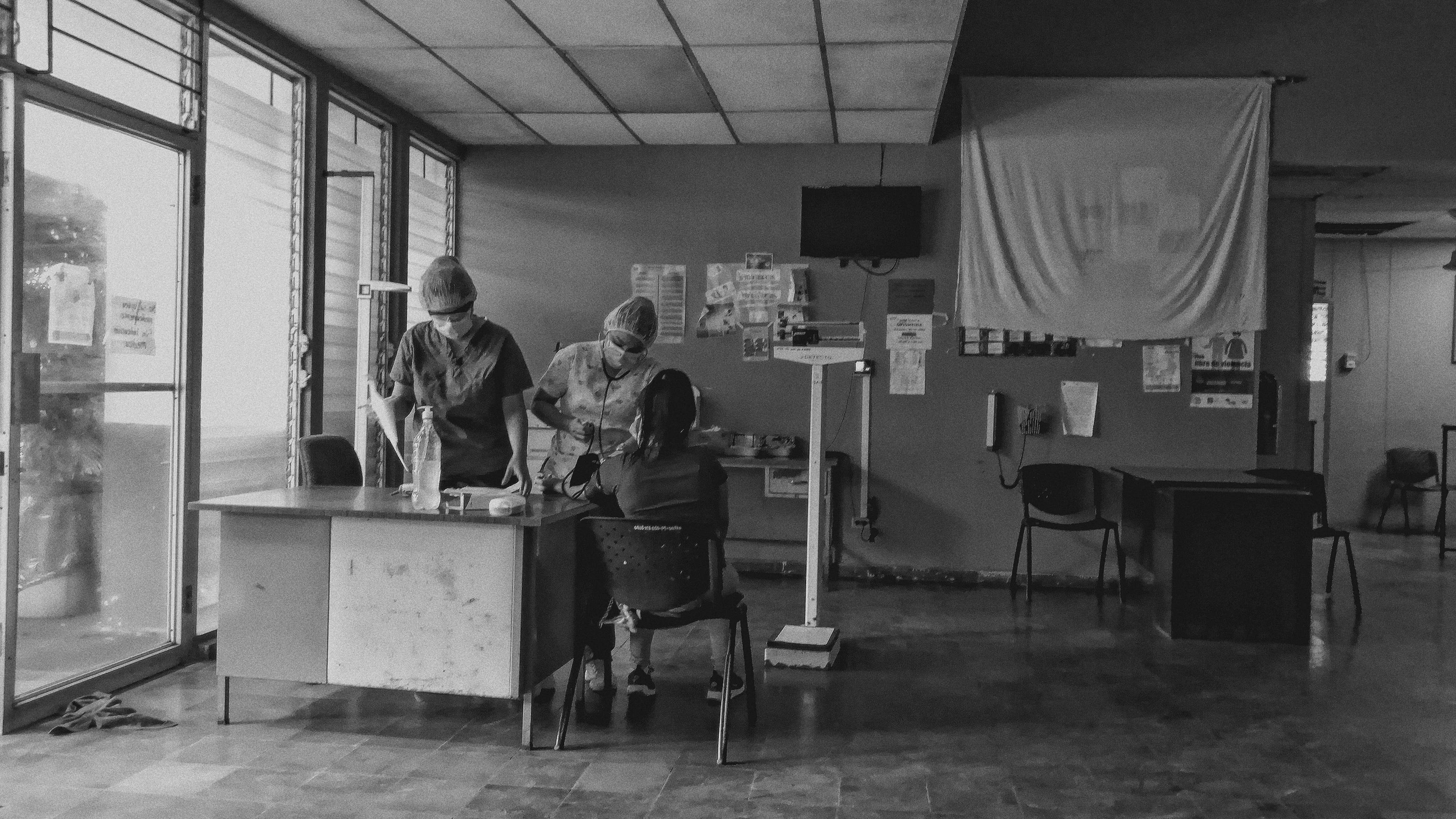 Medical professional in a clean clinic examination room