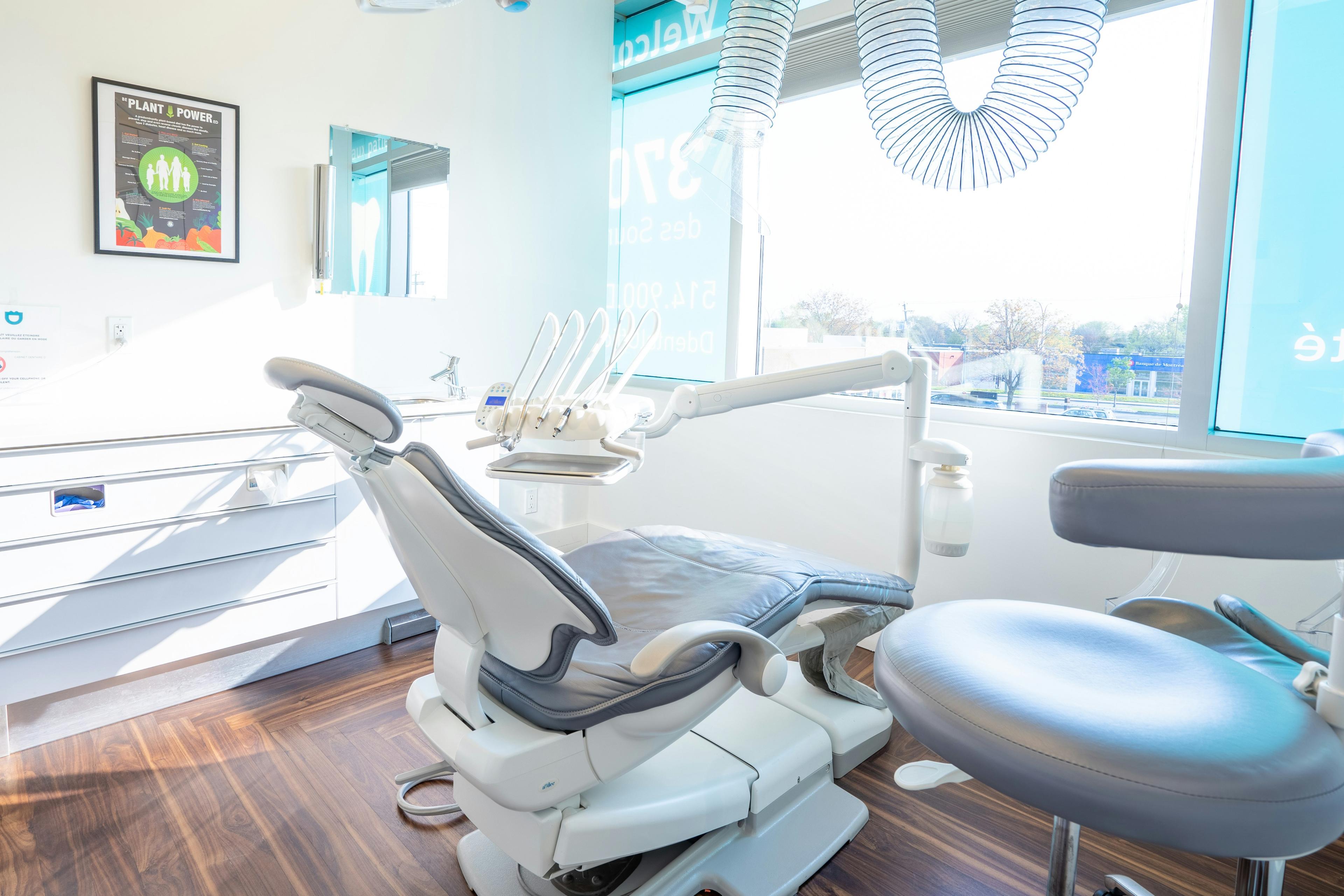 Bright and modern dental clinic with dental chair and equipment
